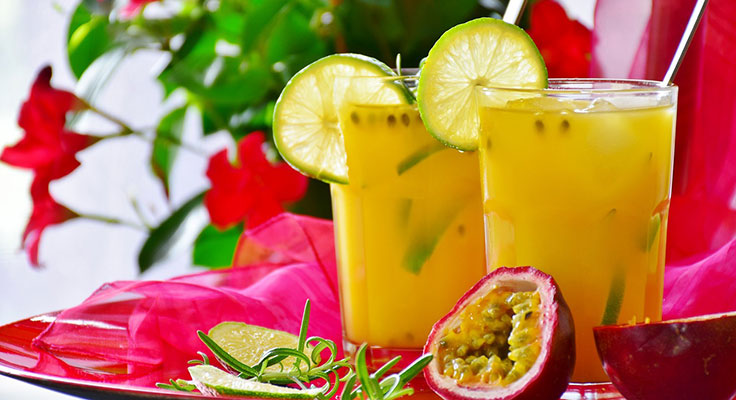 Fresh passion fruit juice with lime garnish