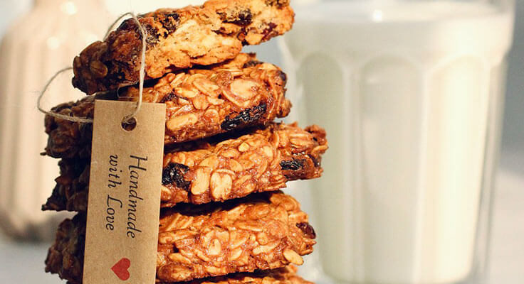 Stack of oatmeal cookies with milk.