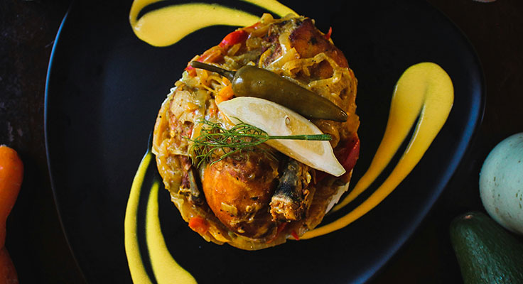 Elegant gourmet chicken dish on artistic plate