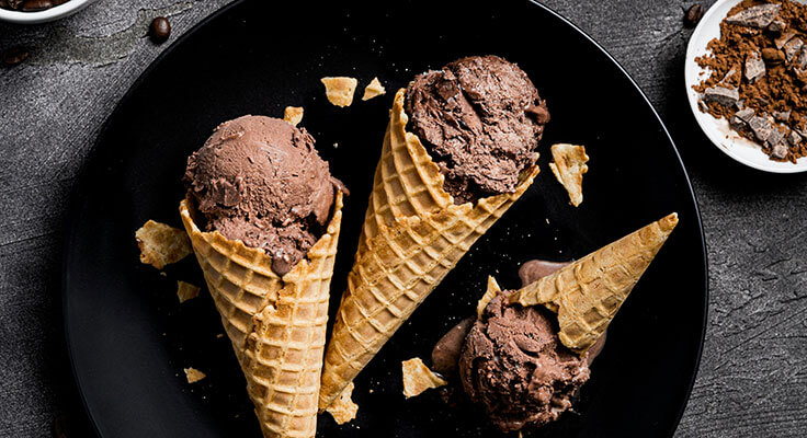 Chocolate ice cream cones on plate