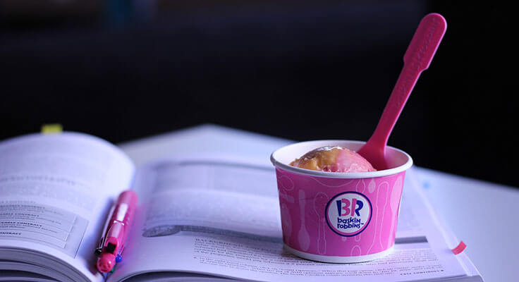Baskin Robbins ice cream with spoon on book