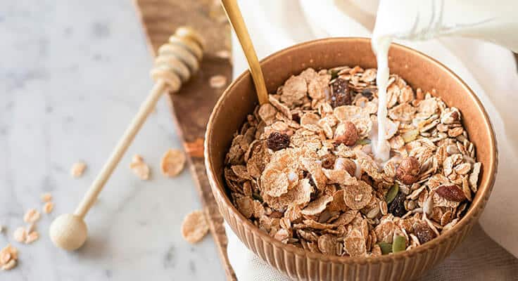 bowl of cereal with honey
