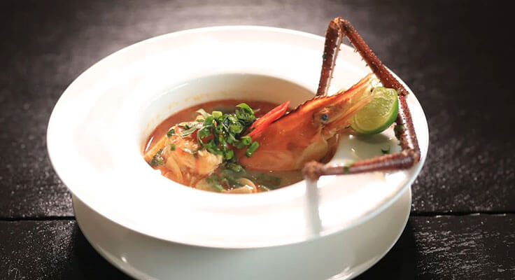 Shrimp soup with lime and herbs