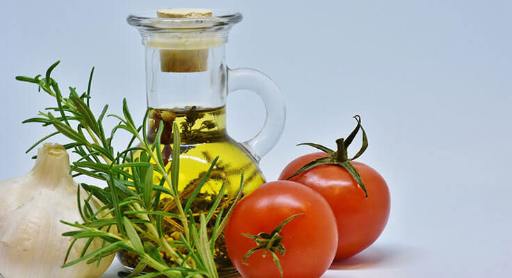 Garlic, herbs, olive oil, tomatoes