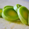 Sliced fresh leeks on cutting board