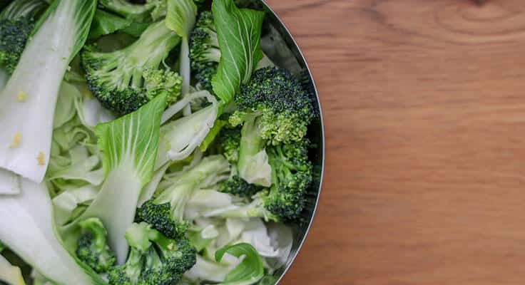 Bowl of fresh broccoli and bok choy